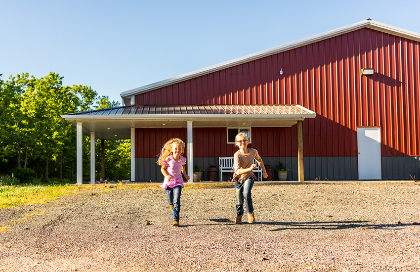 Two girls running toward the camera